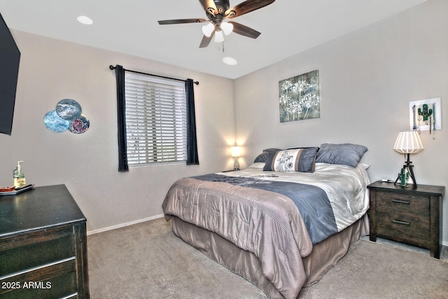 bedroom featuring carpet floors, baseboards, and a ceiling fan