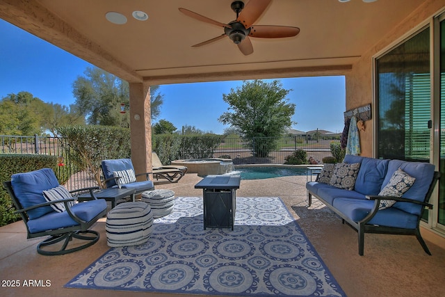 view of patio / terrace featuring ceiling fan, outdoor lounge area, a fenced backyard, and a fenced in pool