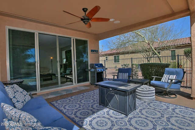 view of patio / terrace featuring ceiling fan, area for grilling, and fence