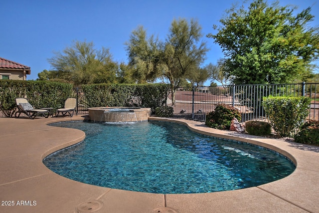 view of swimming pool with a pool with connected hot tub, fence, and a patio