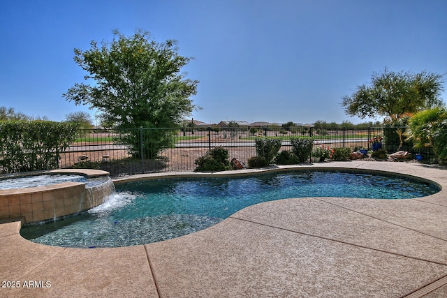 view of swimming pool featuring an in ground hot tub, a patio area, fence, and a fenced in pool