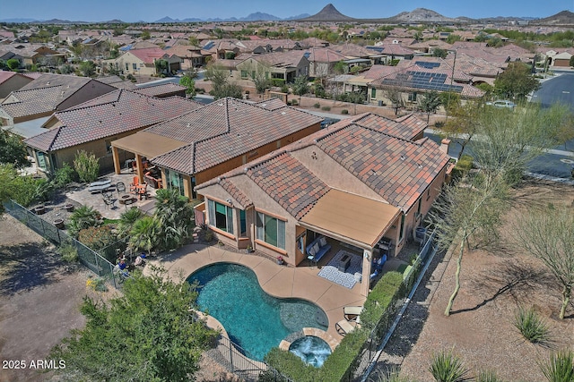 bird's eye view featuring a residential view and a mountain view