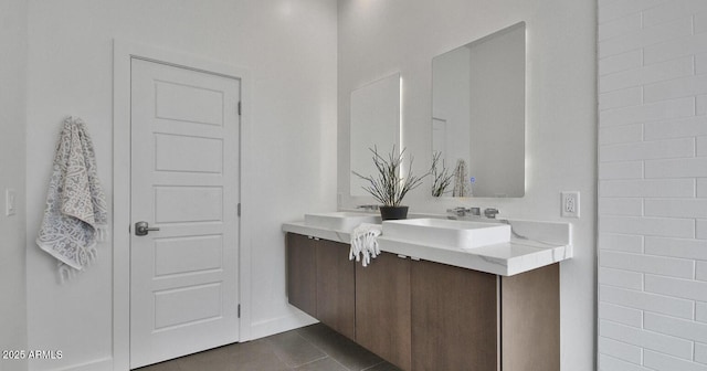 bathroom featuring vanity and tile patterned flooring