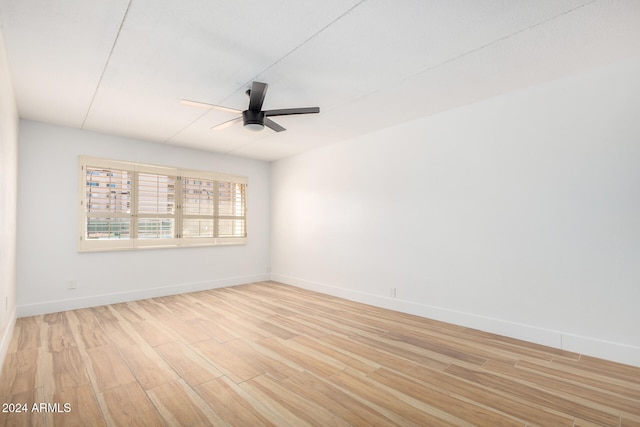 unfurnished room with light hardwood / wood-style floors and ceiling fan