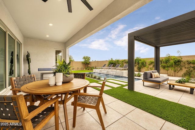 view of patio featuring a fenced in pool, outdoor dining space, a fenced backyard, and outdoor lounge area