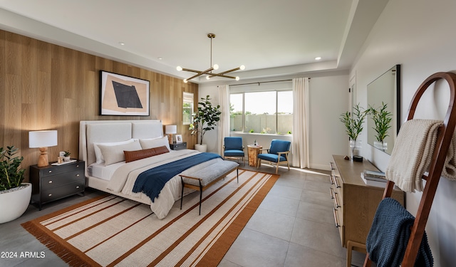 tiled bedroom featuring wooden walls, a notable chandelier, and recessed lighting