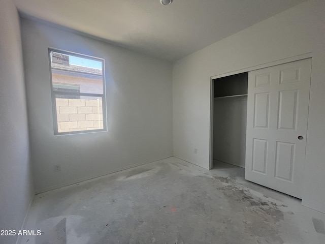 unfurnished bedroom with a closet