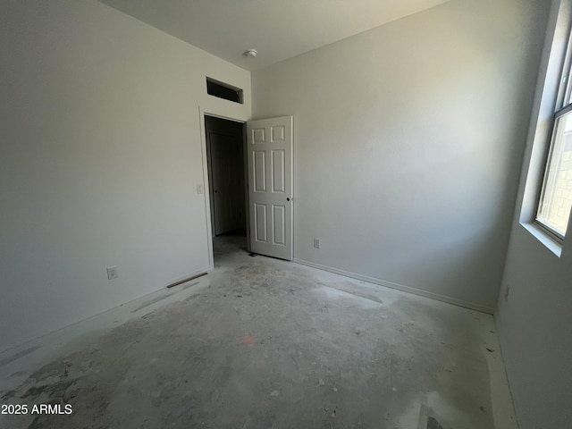 empty room featuring concrete floors