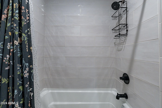 bathroom with shower / tub combo