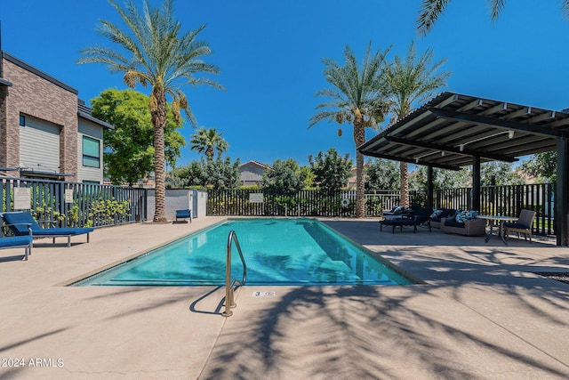 view of swimming pool with a patio and outdoor lounge area