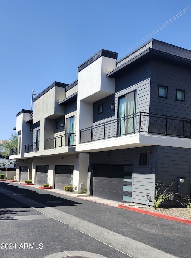 view of building exterior featuring a garage