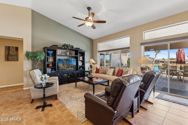 tiled living room featuring lofted ceiling and ceiling fan