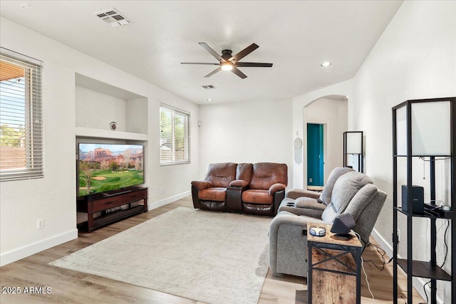 462 W Myrtle Dr, Chandler, AZ 85248 - living area featuring arched walkways, a ceiling fan, wood finished floors, baseboards, and recessed lighting