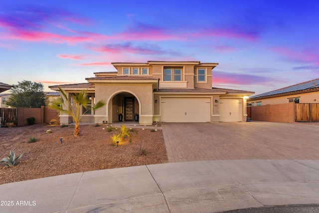 view of front of property featuring a garage