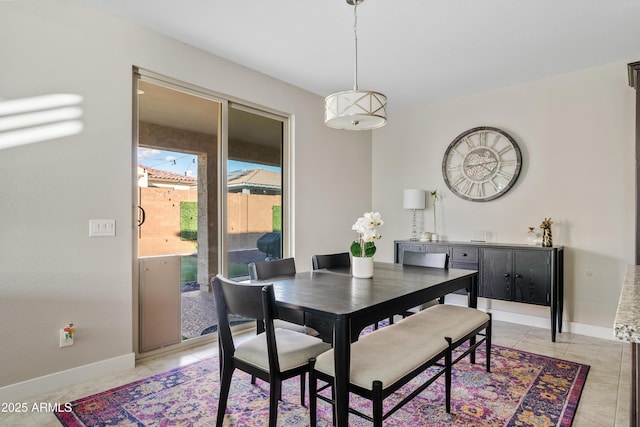 view of tiled dining space