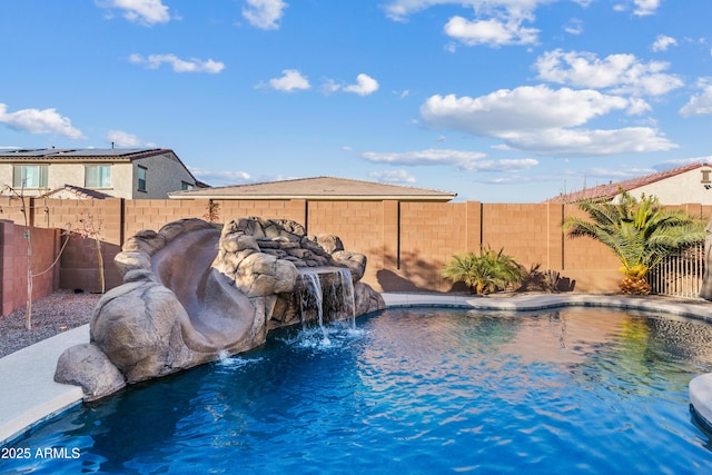 view of pool with pool water feature