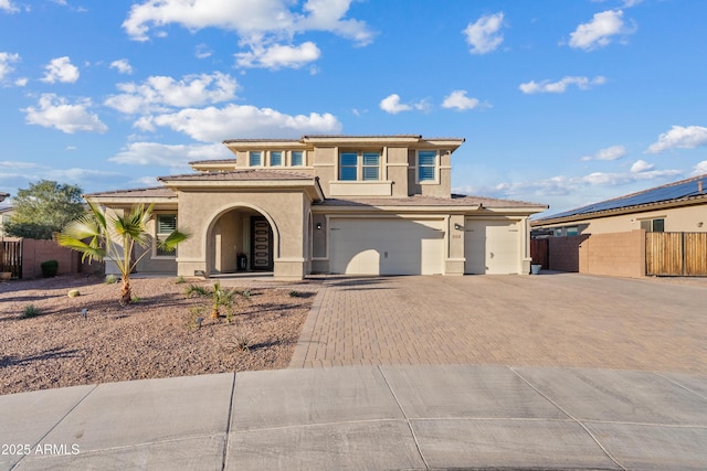 view of front of property with a garage