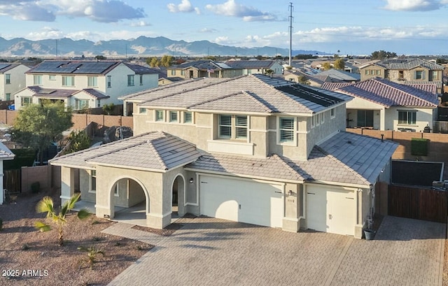 view of front of home with a mountain view