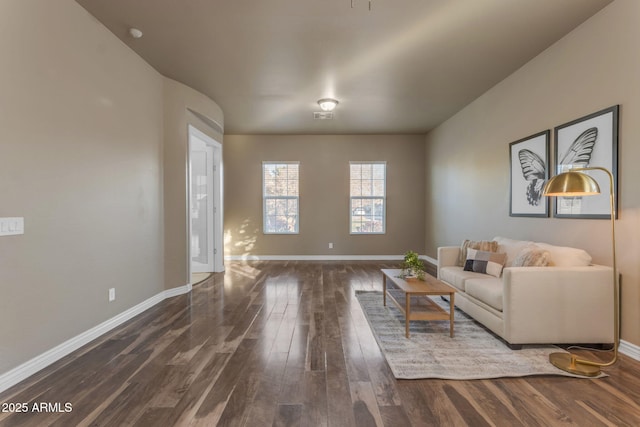 unfurnished living room with hardwood / wood-style floors