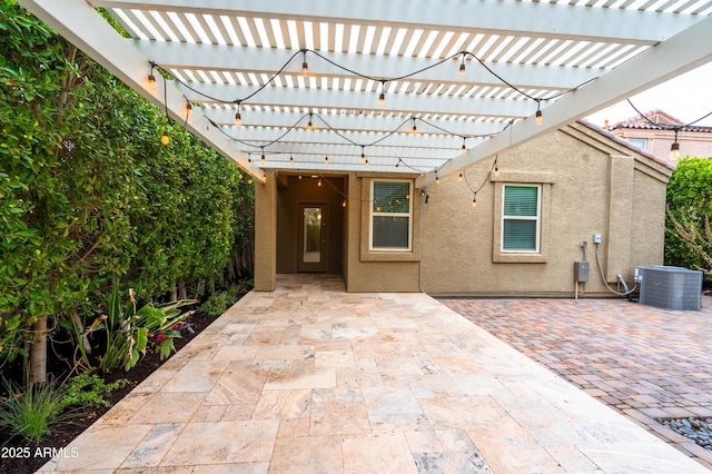 view of patio / terrace featuring a pergola and central air condition unit