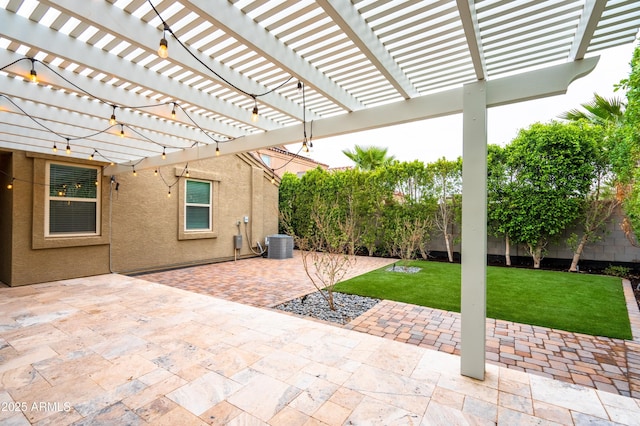 view of patio / terrace featuring cooling unit and a fenced backyard