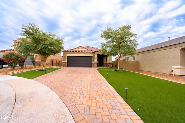 view of front of home with a garage, a tiled roof, fence, decorative driveway, and stucco siding