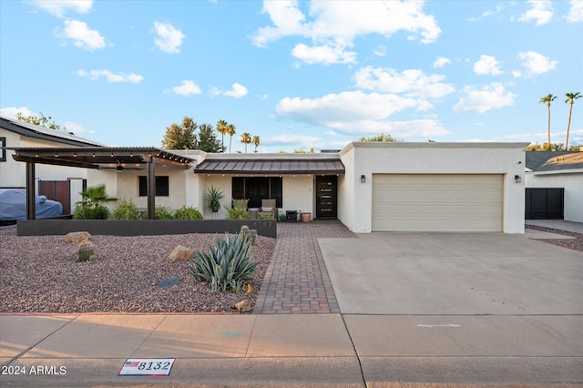 view of front of property featuring a garage