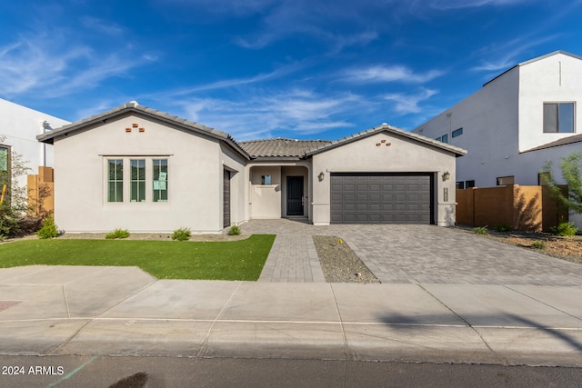 view of front of property featuring a garage