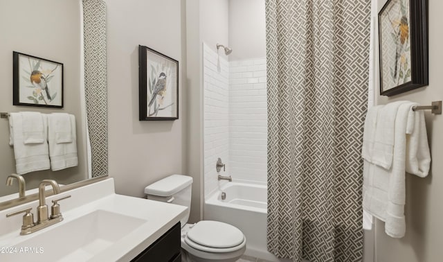 full bathroom featuring vanity, toilet, and shower / tub combo