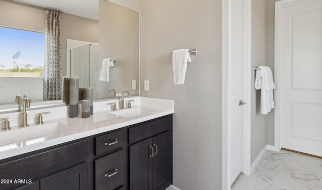 bathroom with walk in shower and vanity