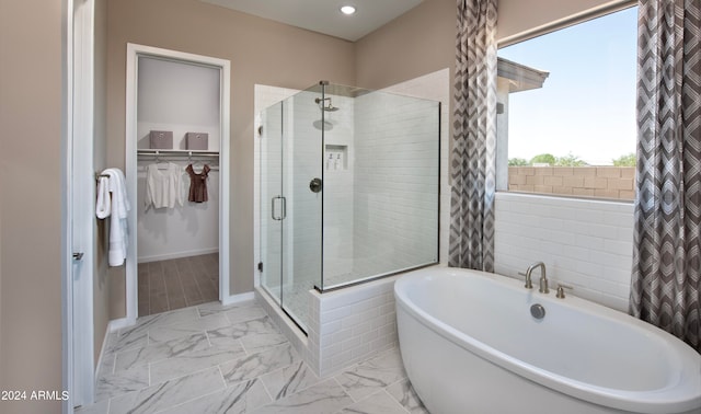 bathroom with independent shower and bath