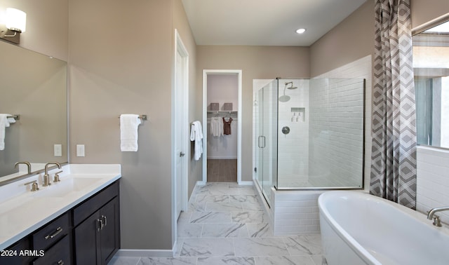 bathroom with vanity and plus walk in shower