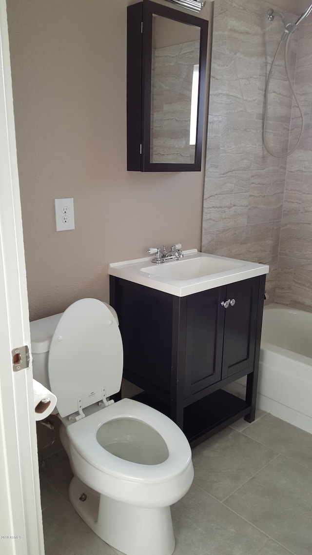 725 E Hidalgo Ave, Phoenix, AZ 85040 - bathroom with tile patterned floors, vanity, and  shower combination