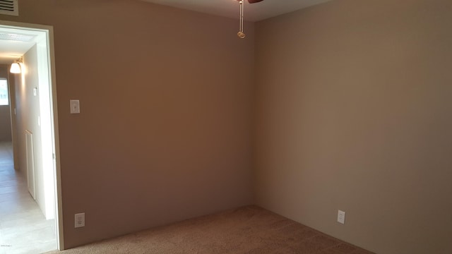 725 E Hidalgo Ave, Phoenix, AZ 85040 - empty room featuring light carpet and a ceiling fan