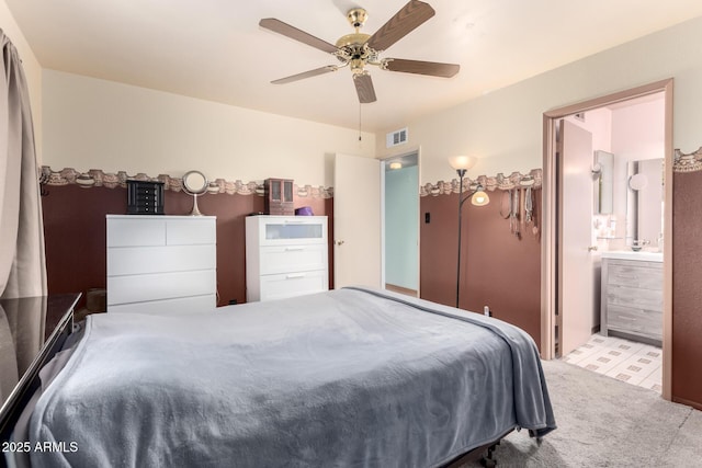 1409 S Revere, Mesa, AZ 85210 - bedroom featuring carpet, a ceiling fan, and connected bathroom