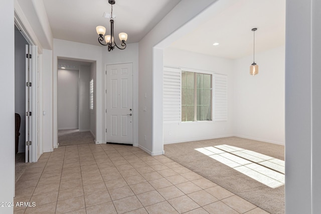 11122 E Tripoli Ave, Mesa, AZ 85212 - entryway with a chandelier, light colored carpet, and light tile patterned floors