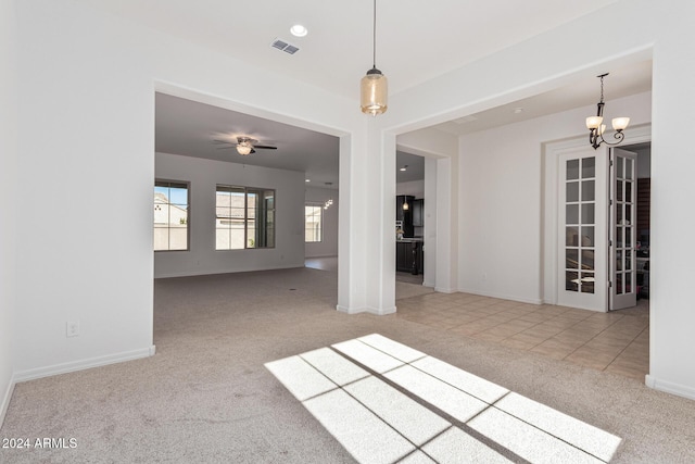 11122 E Tripoli Ave, Mesa, AZ 85212 - spare room featuring carpet and a chandelier