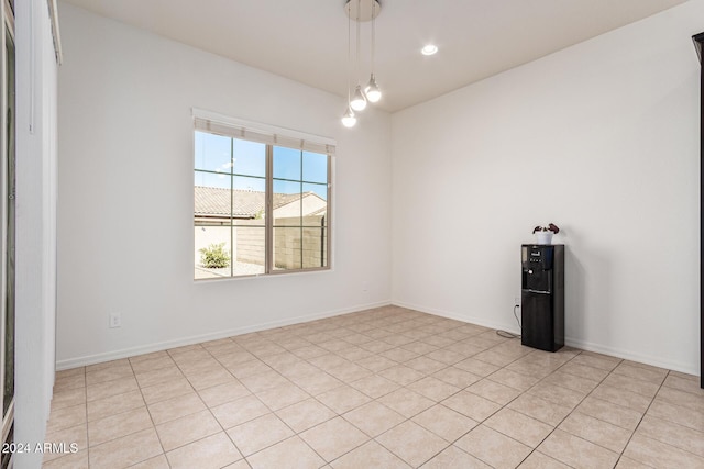 11122 E Tripoli Ave, Mesa, AZ 85212 - spare room featuring baseboards and recessed lighting