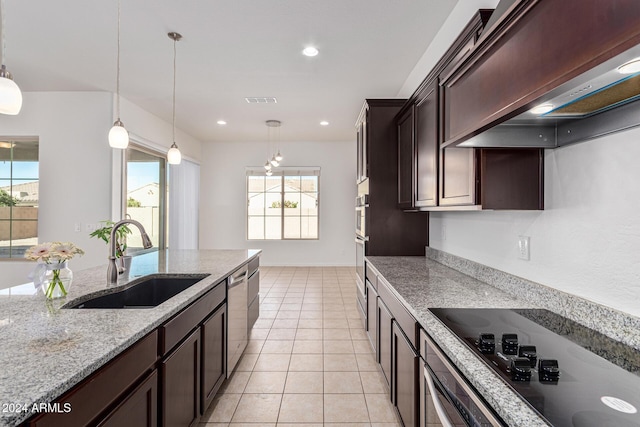 11122 E Tripoli Ave, Mesa, AZ 85212 - kitchen with extractor fan, stainless steel appliances, dark brown cabinetry, decorative light fixtures, and light stone countertops
