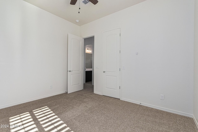 11122 E Tripoli Ave, Mesa, AZ 85212 - carpeted empty room with a ceiling fan and baseboards
