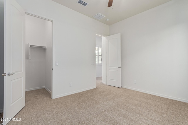 11122 E Tripoli Ave, Mesa, AZ 85212 - empty room with light colored carpet and ceiling fan