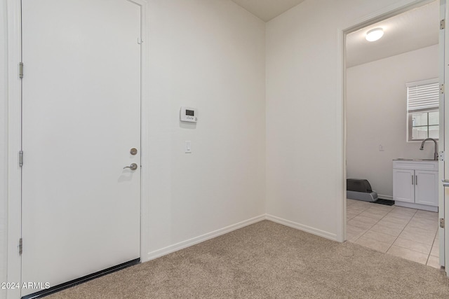 11122 E Tripoli Ave, Mesa, AZ 85212 - laundry room featuring light colored carpet and light tile patterned floors