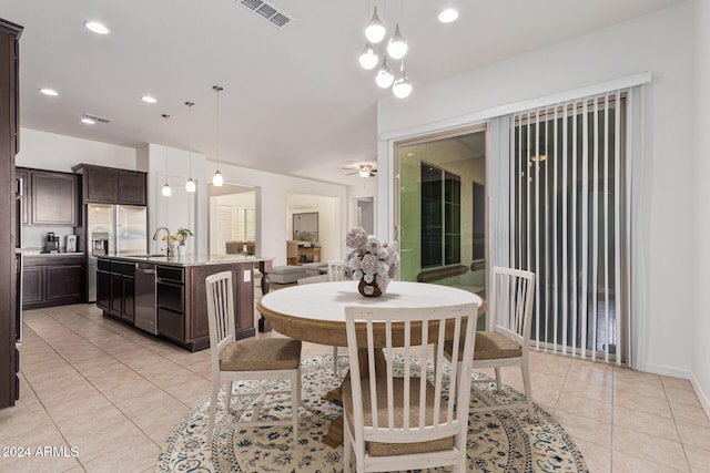 11122 E Tripoli Ave, Mesa, AZ 85212 - dining room featuring light tile patterned flooring, ceiling fan, and recessed lighting