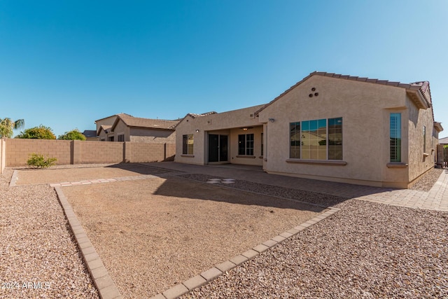 11122 E Tripoli Ave, Mesa, AZ 85212 - rear view of house featuring stucco siding, a fenced backyard, and a patio area