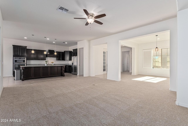 11122 E Tripoli Ave, Mesa, AZ 85212 - unfurnished living room featuring light colored carpet, a ceiling fan, and recessed lighting