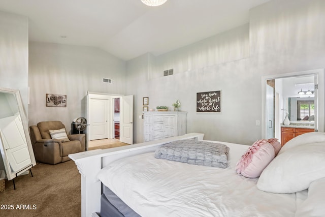 4735 E Harmony Cir, Mesa, AZ 85206 - carpeted bedroom with high vaulted ceiling and connected bathroom