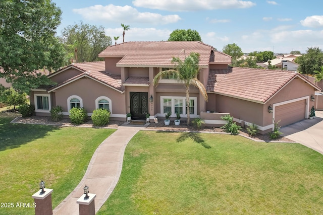 4735 E Harmony Cir, Mesa, AZ 85206 - mediterranean / spanish-style house featuring stucco siding, concrete driveway, an attached garage, and a front lawn