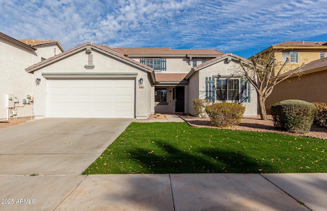 mediterranean / spanish-style house with a garage, driveway, a front lawn, and stucco siding