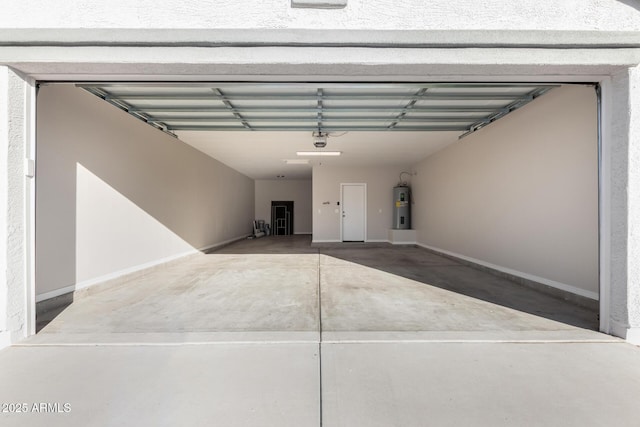 garage with water heater and a garage door opener