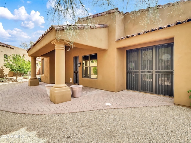 back of house featuring a patio